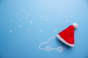 Christmas holiday gift box with car on blue background
