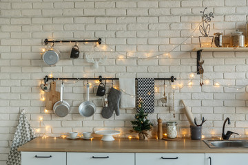 Interior light kitchen with christmas decor and tree