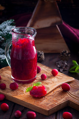 Cranberry Sauce on a wooden board, selective focus