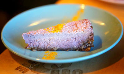 Macro photo of bright tasty raff vegan cheesecake