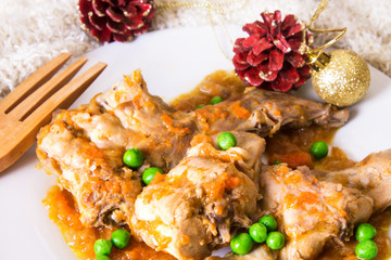 Christmas food, stewed rabbit with carrots and peas
