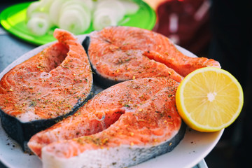 Fresh salmon fish with spice. Selective focus.