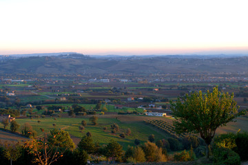 panoramic view,landscape,autumn,hill,countryside,agriculture,italy,horizon,green,sky,sunset