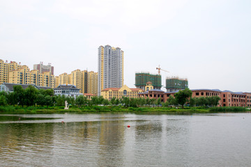 unfinished buildings by the water side