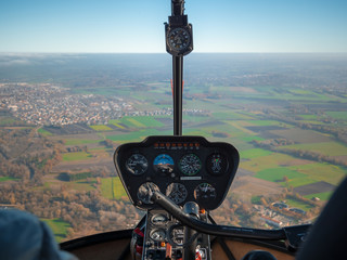 helicopter view from top to munich and bavarian landscape during fog autumn blue sky