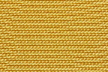 Knitted yellow fabric texture, textile background