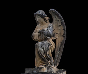 Antique medieval statue of a cemetery angel