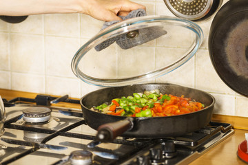 Chopped vegetables on frying pan