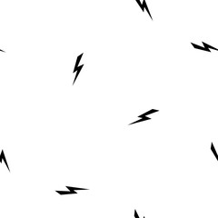 Black lightning bolt simple seamless pattern. storm or thunder and lightning strike ornament on white.