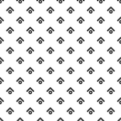 Seamless pattern with black strokes and circles on white background. Ethnic symmetric background.