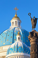 Fototapeta premium Saint Petersburg. Beautiful blue domes of the Trinity Cathedral (Troitsky Izmailovsky Sobor) with Column of Glory are one of the main architectural sights of the city on a sunny winter day