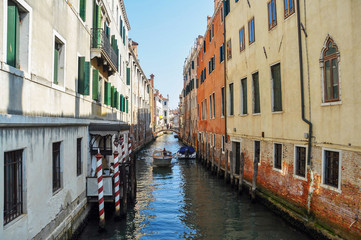 Fototapeta na wymiar Narrow water streets of Venice