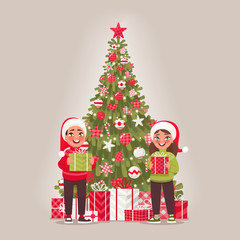 Children and decorated Christmas tree. A boy and a girl are holding gifts. Merry Christmas and Happy New Year