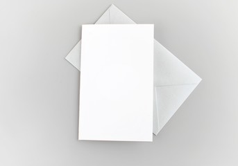 Blank greeting card to place your design, greeting, invitation card mock up, silver envelope.