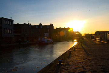 Frozen Union Canal with warm yellow sunset sunset, Edinburgh, Scotland