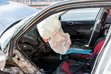 Opened airbag on european car after side collision.