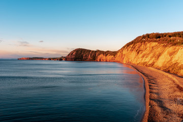 Warm sun on the Jurassic Coast, red sandstone cliffs,. Sidmouth, Devon