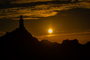 Setting sun and Coastal Silhouette, Corbiere, Jersey, Channel Islands