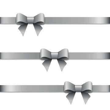 Shiny silver satin bow on a white background.