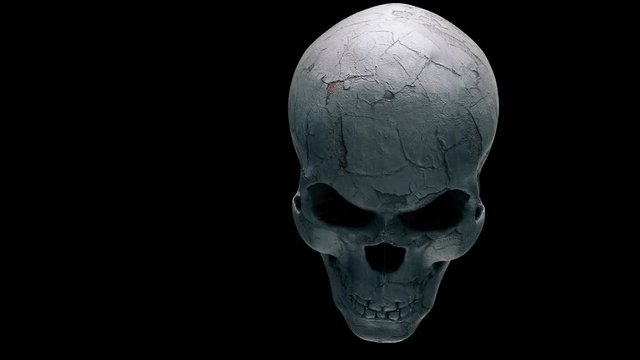 Flashing And Laughing Skull VJ Loop - features a close-up view of an old and damaged laughing skull with flashing light around. This motion graphics is perfect to use in your next halloween and gothic