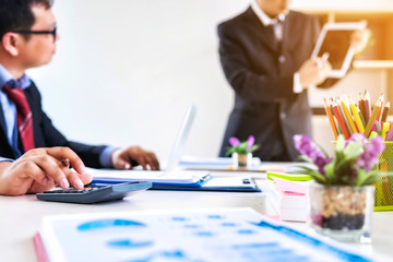 Business people meeting corporate group for discussing the charts and graphs in meeting room. Teamwork successful Meeting Workplace strategy Concept.