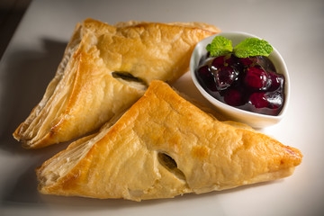 Cherry pie, bakery pastry,  berries jam pie on white dish, selective focus