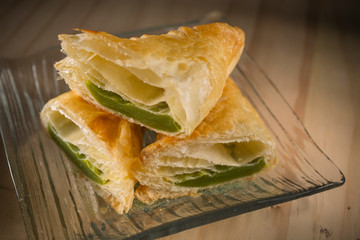 Pandanus or Kaya puff, homemade bakery on wooden background, selective focus