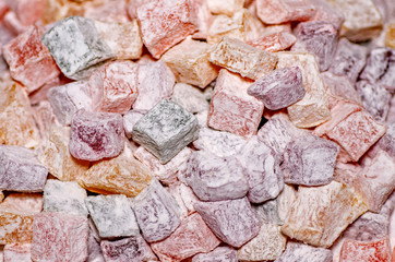 Assorted traditional turkish delight close up. Sugar coated soft candy.
