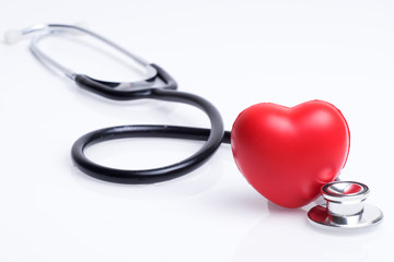 Healthcare or medical concept. Stethoscope and a red heart on a white background.