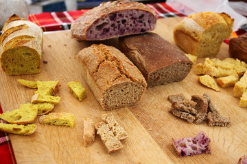 Homemade healthy bread gluten free. Colorful bread made from healthy cereals. healthy gluten-free bread, rooty . Background texture of bread.