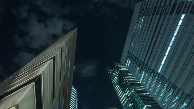 Timelapse shot of office buildings at night, Tokyo, Japan