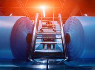 Modern automated production line in factory. Plastic bag manufacturing process