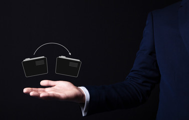 folder icon in businessman hand