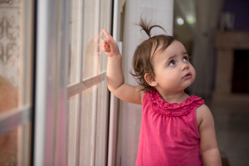 Pretty baby posing at home