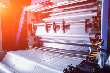 Modern automated production line in factory. Plastic bag manufacturing process