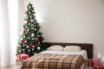 Christmas bedroom Interior Christmas tree and gifts new year