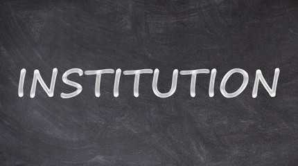 Obraz premium Institution written on blackboard