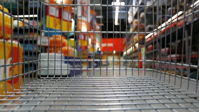 Time lapse of trolley moving through supermarket
