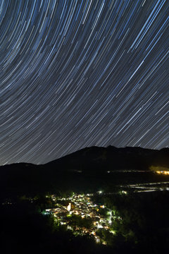 startrails over Sassalbo in the summer night, municipality of CFivizzano, Massa Carrara province, Tuscany district, Italy, Europe