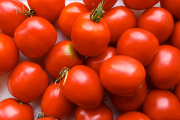 background of red tomatoes. a lot of red tomatoes background. Red tomatoes background.