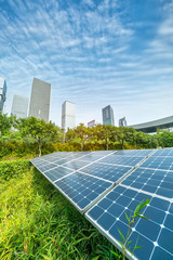 Ecological energy renewable solar panel plant with urban landscape landmarks