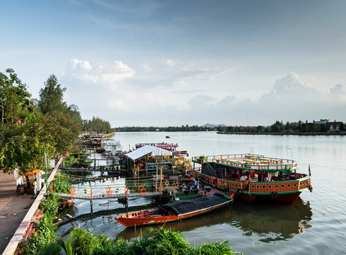 tourist restaurant boats at riverside in central kampot town cambodia
