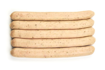 Raw Nuremberg Sausages, top view, isolated on a white background. Close-up.