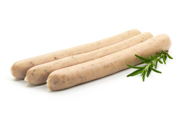 White Sausages For Grill with herbs, isolated on a white background. Close-up.