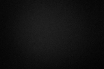 Black paper texture or background.