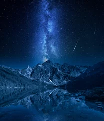 Foto op Canvas Milky way over mountains lake at night, Poland, Europe © shaiith