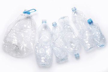 Concepts of pollution and recycling. Different used plastic bottles