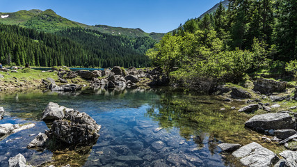 lake in the mountains, obernberger see, tirol, austria