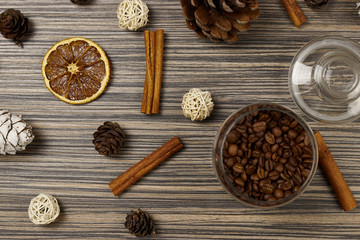 Christmas composition with spices and branches on wood