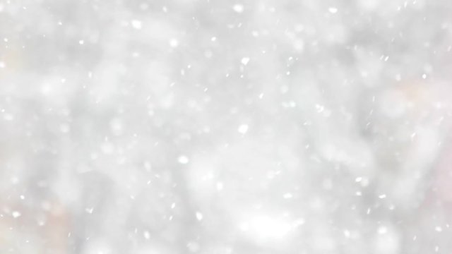 Close up of falling snowflakes. Abstract winter background. Winter holiday wallpaper.